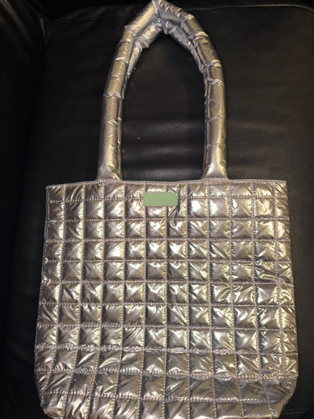 Clinique Limited Editionโ Silver quilted puffer tote bag